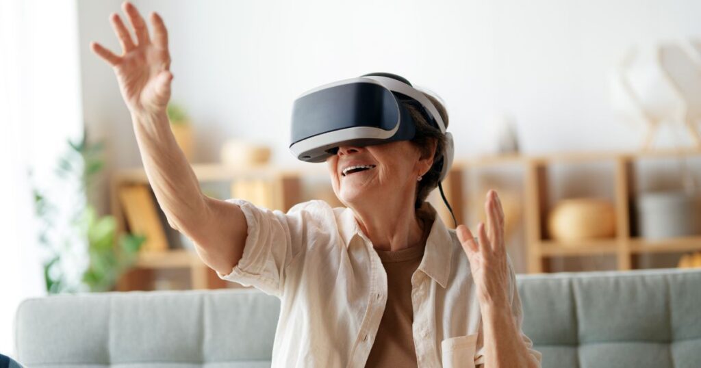 starsza kobieta ma gogle vr