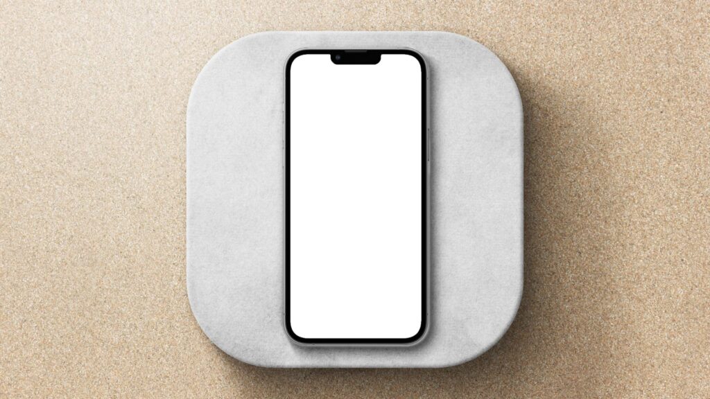 telefon iPhone leży na kamieniu